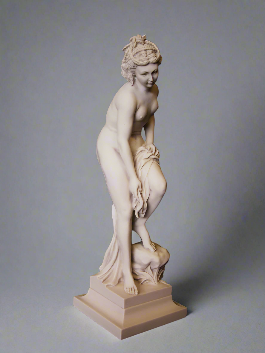 Statue of a woman on a gray background