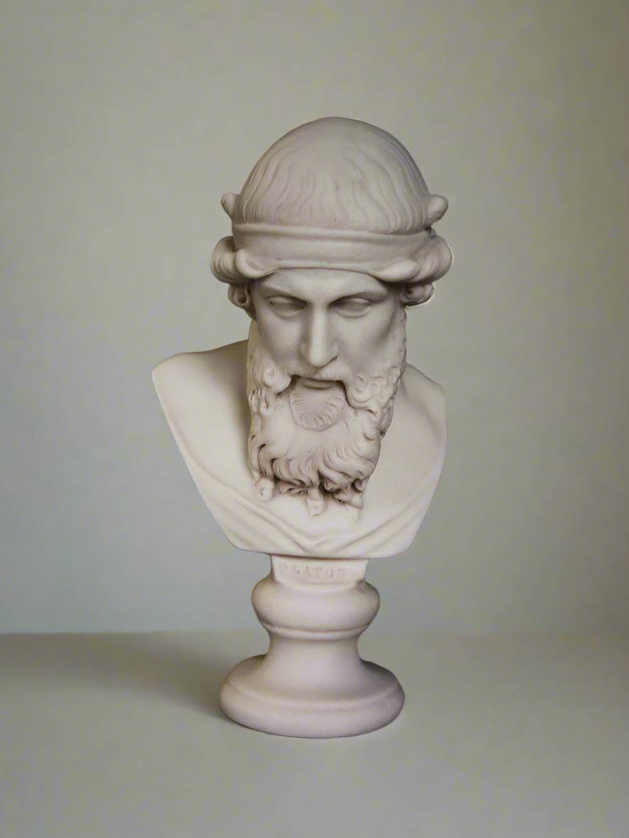 A white marble bust of Plato with a dark background.