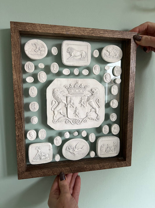 A Group Of Intaglio's Set Upon Glass