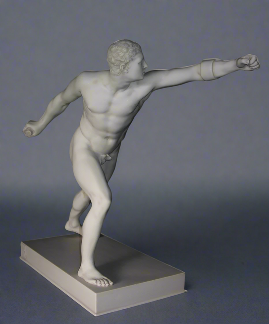 Statue of a classical athlete in a dynamic pose on a gray background