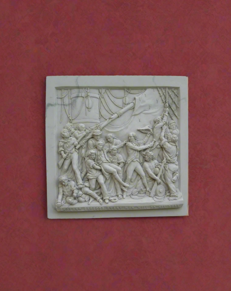 Decorative stone plaque with relief sculpture