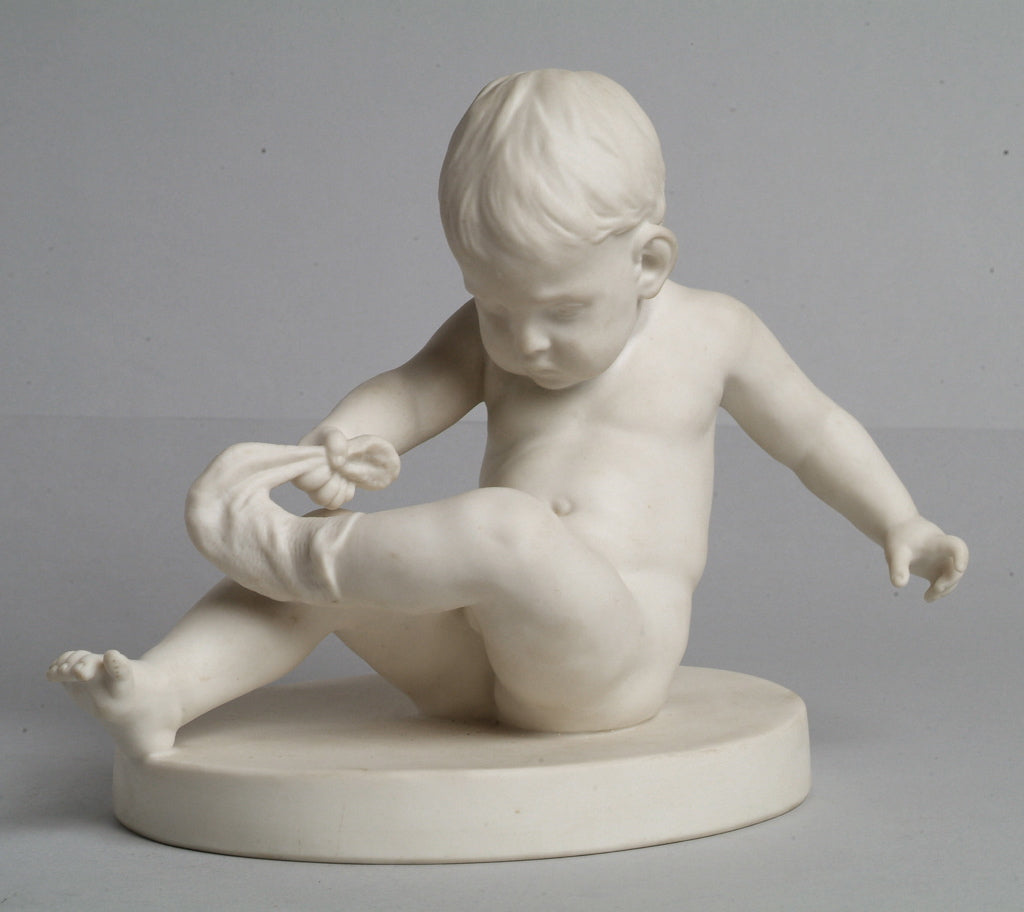 Baby Boy tirant sur la scène des chaussettes