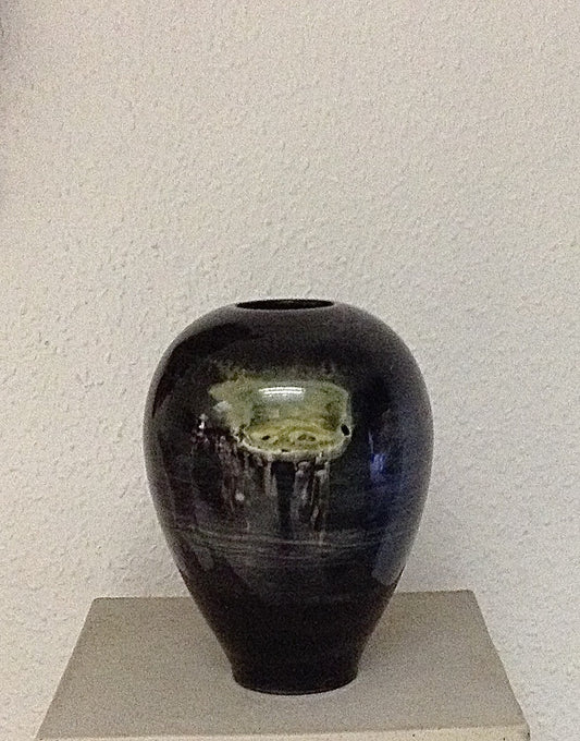 Ancient Black Marble Orb Vase