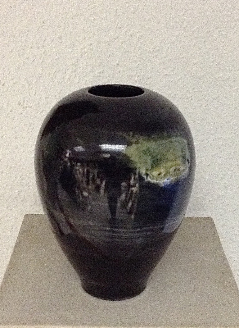 Ancient Black Marble Orb Vase