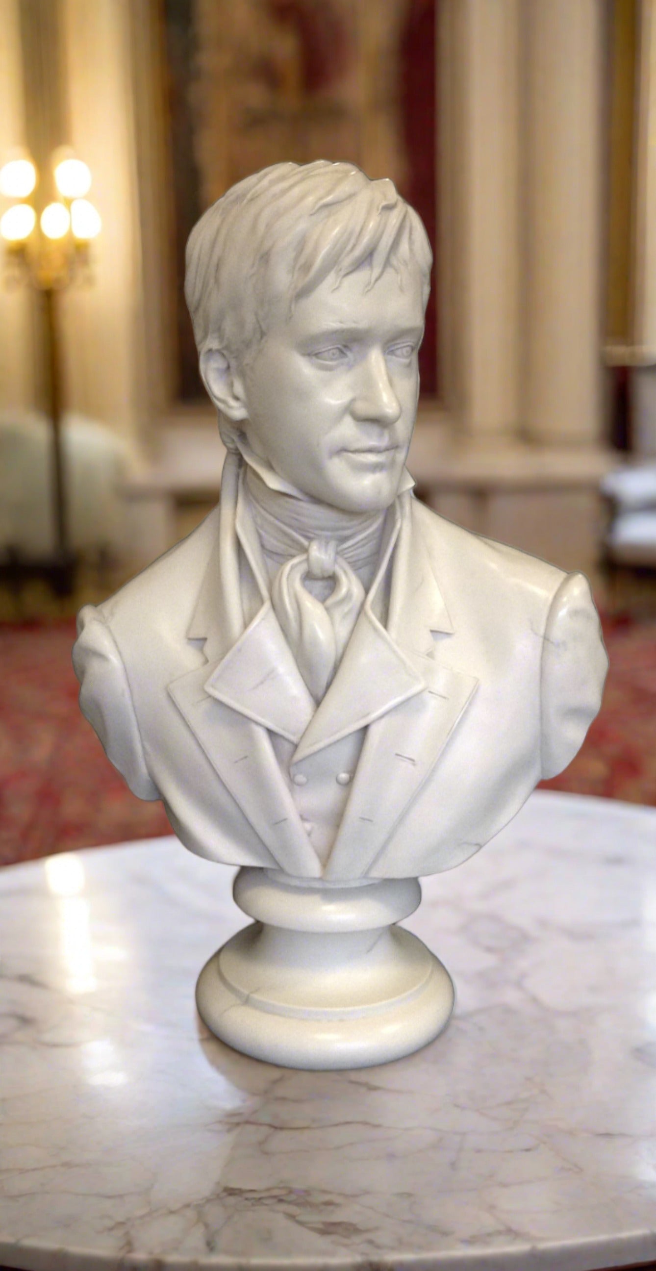 A sculptured marble bust of Fitzwilliam Darcy from the film 'Pride and prejudice', displayed on a surface.
