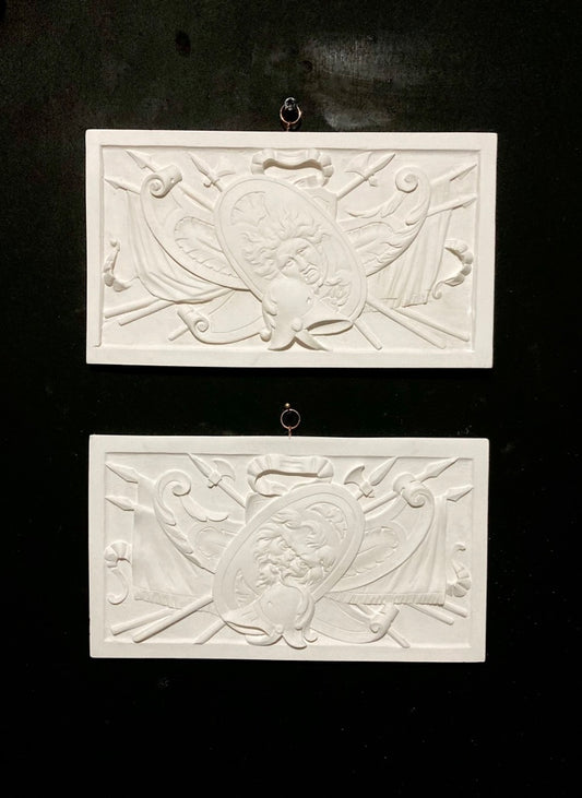 The Armorial Pair, Wall reliefs