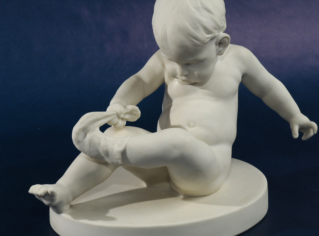 Baby Boy tirant sur la scène des chaussettes