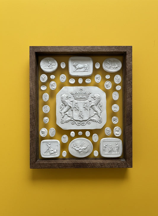 A Group Of Intaglio's Set Upon Glass