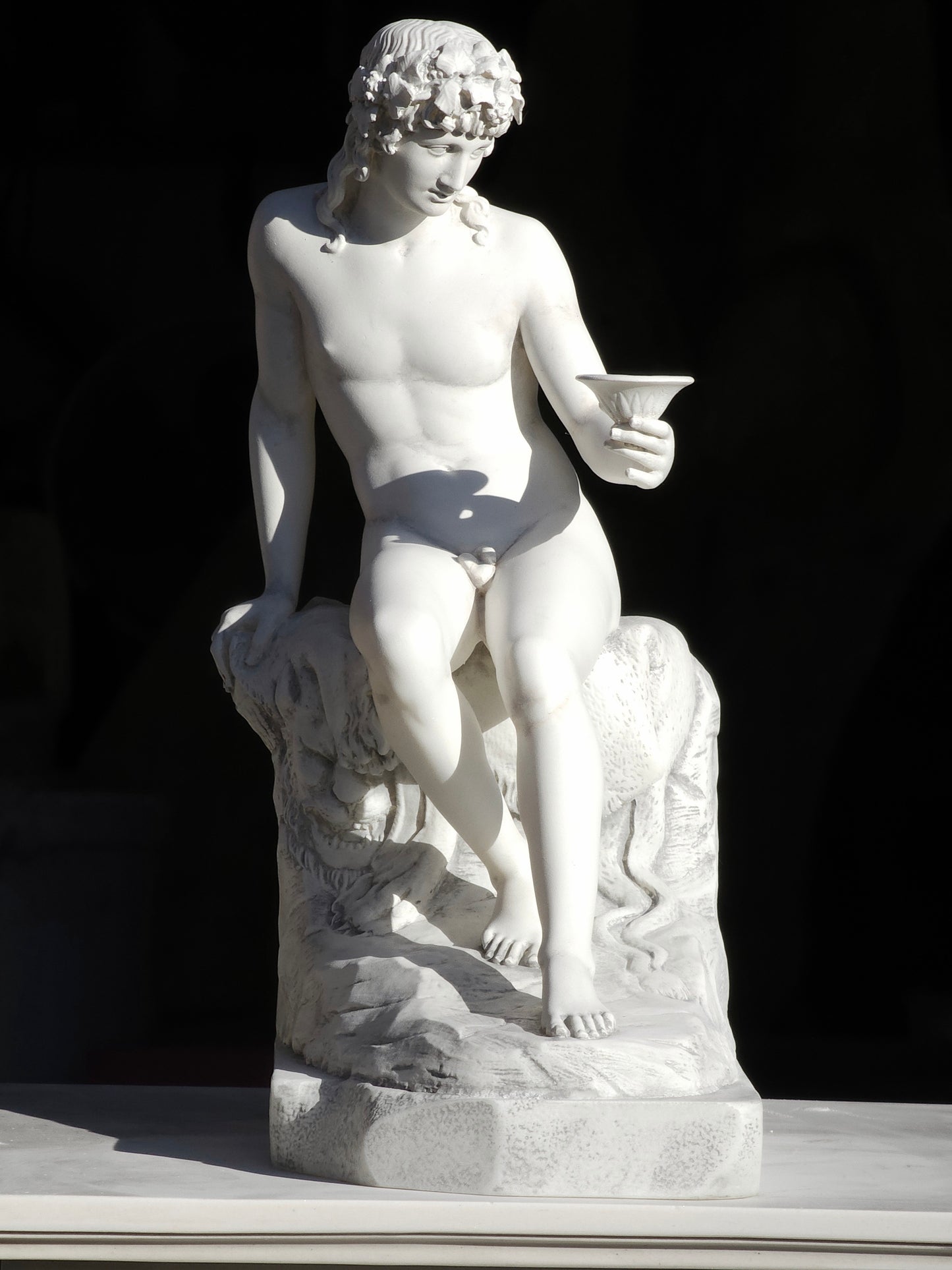 Bacchus Seated