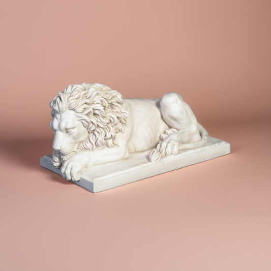 Lions couchés par paire, grands