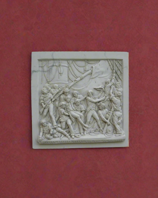 Decorative stone plaque with relief sculpture